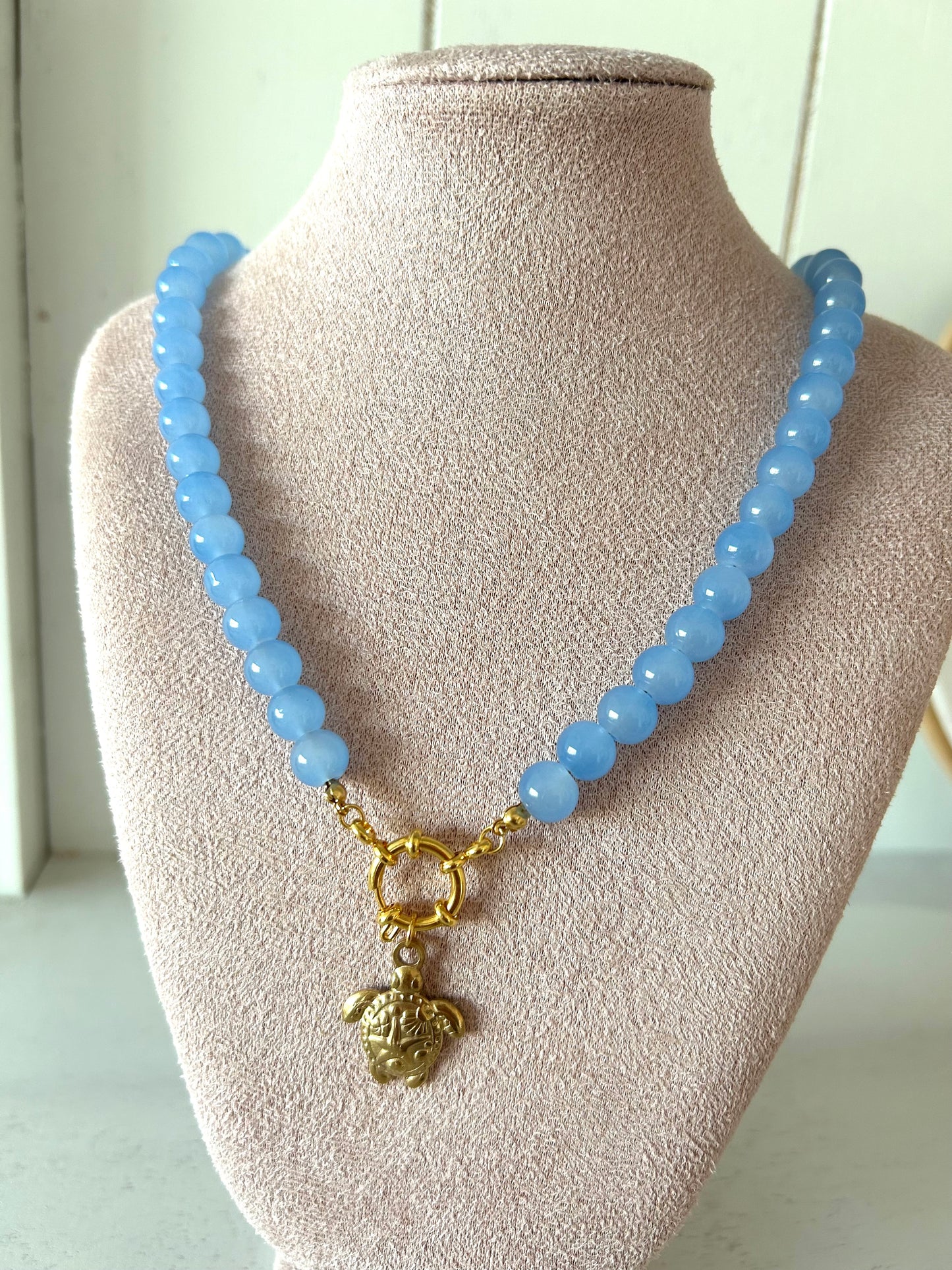 Glas kralenketting met schildpadbedel blauw - goud