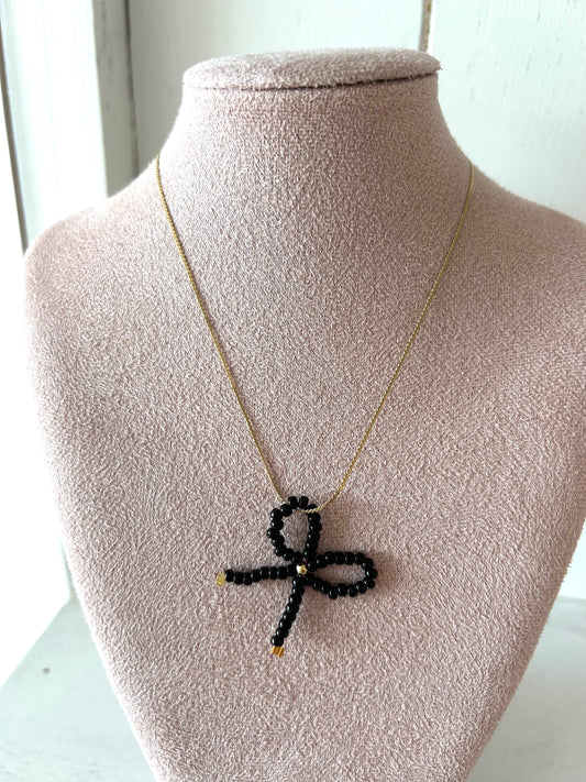 Ketting met zwart strikje - goud