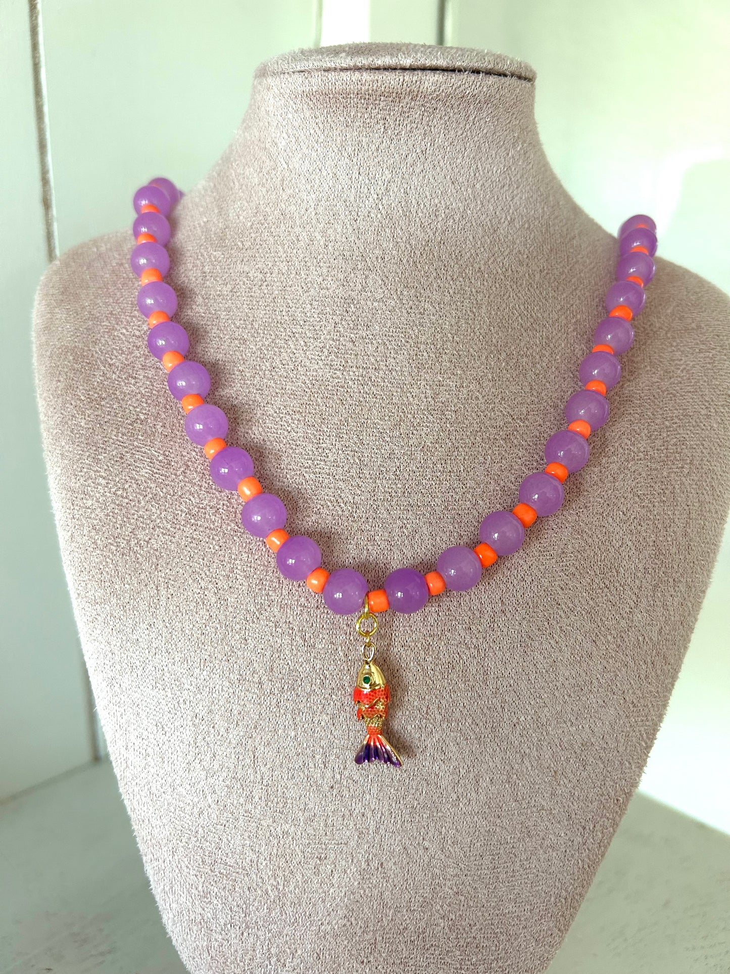 Kralenketting little fish paars/oranje - goud