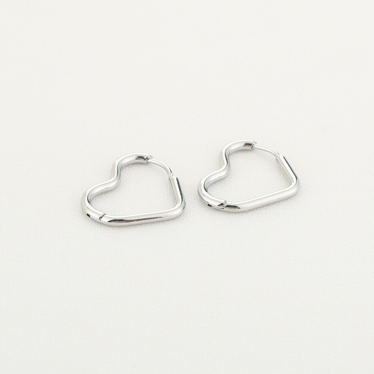 Oorbellen open heart zilver